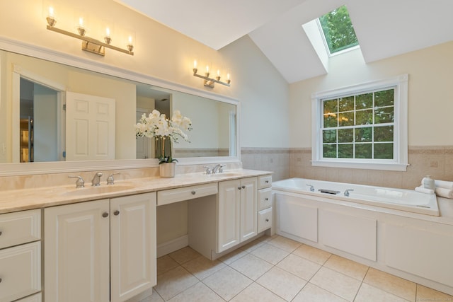 41 Madison Way S, Windsor, CT 06074 - bathroom with a skylight, double vanity, tile patterned flooring, vaulted ceiling, and a garden tub