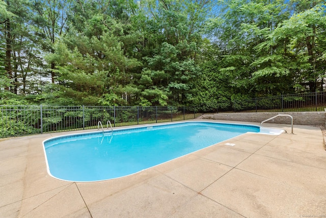 41 Madison Way S, Windsor, CT 06074 - view of pool featuring a patio and view of wooded area