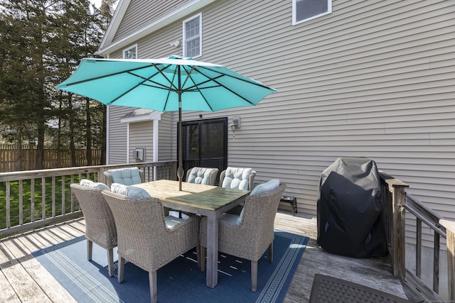 14 Cutter Dr, Stonington, CT 06355 - deck with outdoor dining space, grilling area, and fence