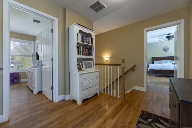 14 Cutter Dr, Stonington, CT 06355 - hall with an upstairs landing, wood finished floors, and baseboards