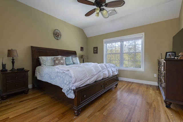 14 Cutter Dr, Stonington, CT 06355 - bedroom with baseboards, wood finished floors, lofted ceiling, and a ceiling fan