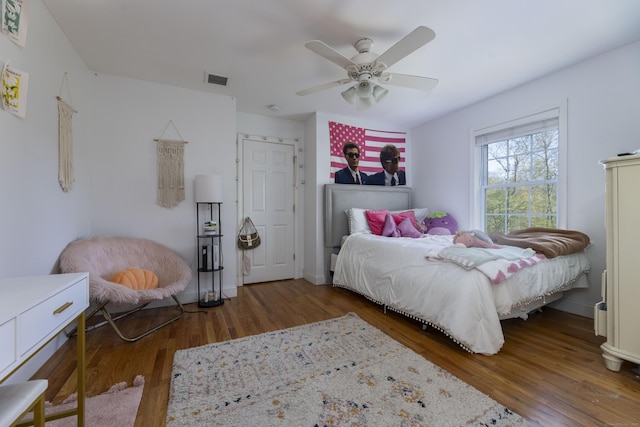 14 Cutter Dr, Stonington, CT 06355 - bedroom with wood finished floors, a ceiling fan, and baseboards