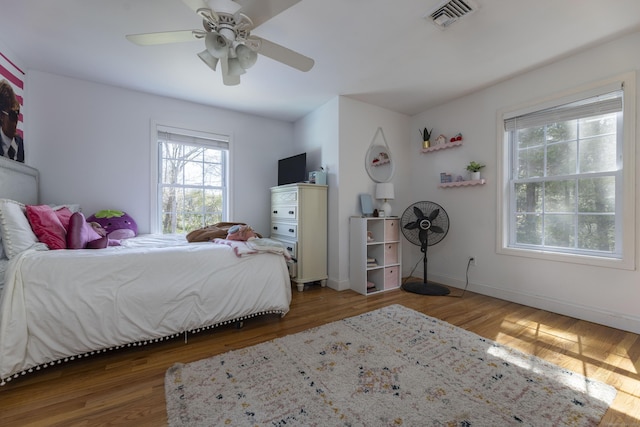 14 Cutter Dr, Stonington, CT 06355 - bedroom featuring wood finished floors, baseboards, and a ceiling fan