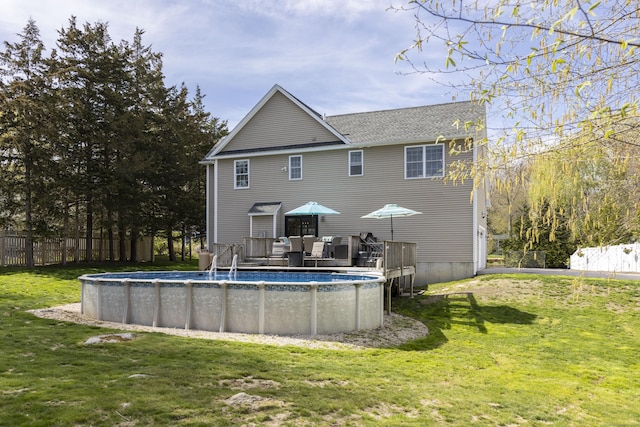 14 Cutter Dr, Stonington, CT 06355 - back of house featuring a wooden deck and a shingled roof