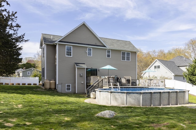 14 Cutter Dr, Stonington, CT 06355 - rear view of property with a wooden deck and a shingled roof