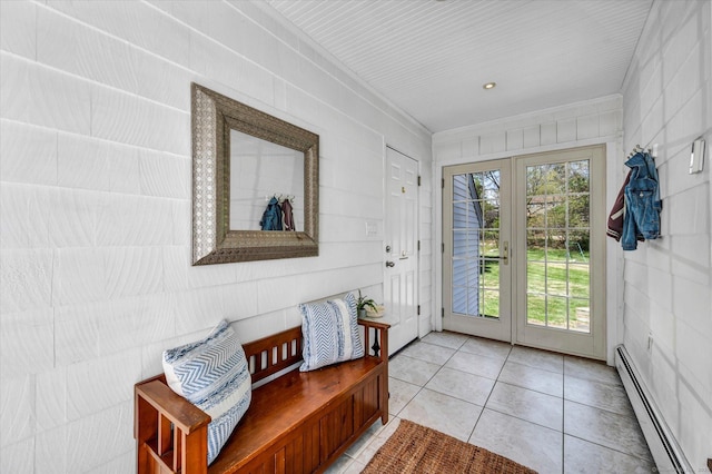 doorway featuring a baseboard heating unit, crown molding, and light tile patterned floors