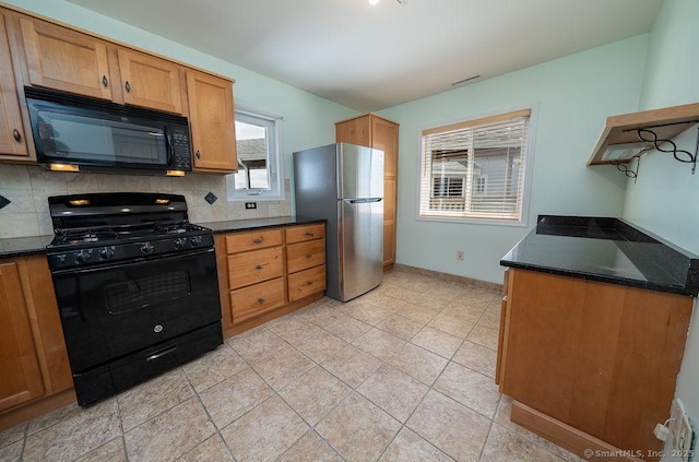 kitchen featuring decorative backsplash, light tile patterned flooring, baseboards, brown cabinets, and black appliances
