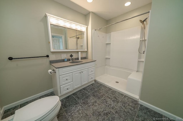 full bathroom featuring walk in shower, vanity, toilet, recessed lighting, and baseboards