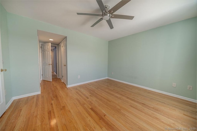 spare room with recessed lighting, baseboards, ceiling fan, and light wood finished floors