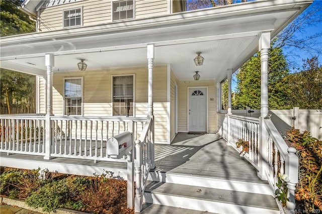 doorway to property with a porch