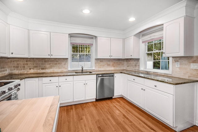 kitchen with dishwasher, dark stone countertops, light wood-style floors, white cabinets, and recessed lighting