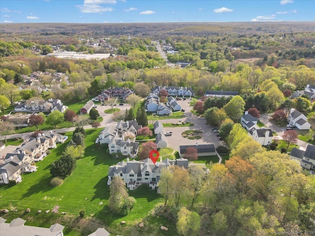 bird's eye view with a view of trees and a residential view