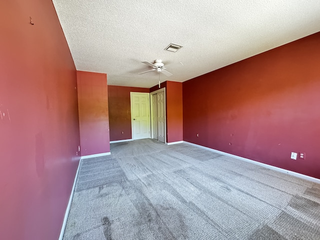 267 Strawberry Cir, Windsor, CT 06095 - unfurnished bedroom featuring a textured ceiling, carpet flooring, baseboards, and a ceiling fan