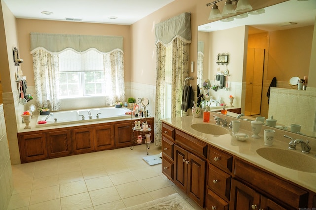 45 N Gate Rd, Woodbury, CT 06798 - bathroom with a bath, double vanity, tile patterned floors, and a wainscoted wall