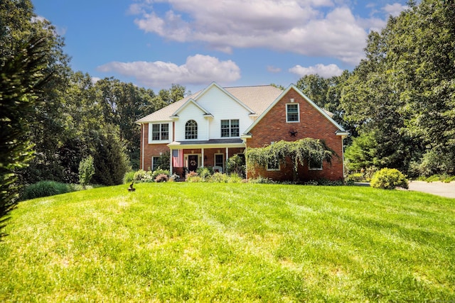 45 N Gate Rd, Woodbury, CT 06798 - view of front of property featuring brick siding and a front yard