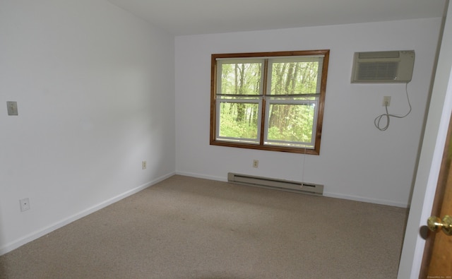 carpeted empty room with a baseboard heating unit, a wall mounted air conditioner, and baseboards