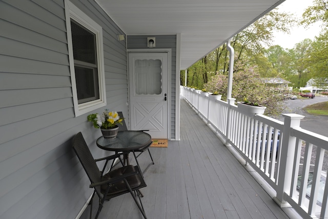 wooden deck featuring a porch