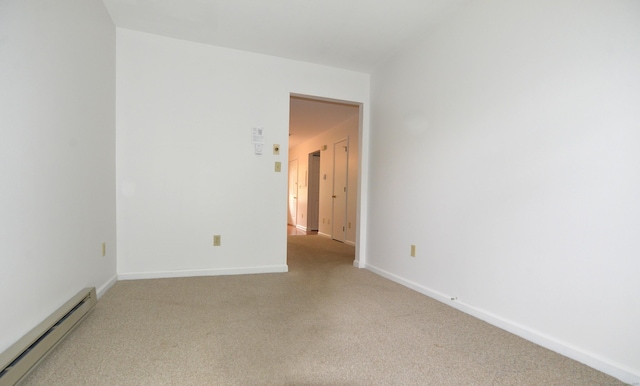 107 Hidden Knolls Cir Unit 107, Monroe, CT 06468 - unfurnished room with a baseboard heating unit, carpet, and baseboards