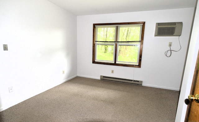 107 Hidden Knolls Cir Unit 107, Monroe, CT 06468 - unfurnished room featuring a baseboard heating unit, carpet floors, a wall mounted air conditioner, and baseboards
