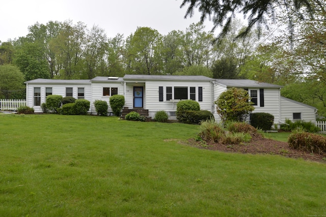59 Old Ridgebury Rd, Danbury, CT 06810 - manufactured / mobile home featuring a front lawn and fence