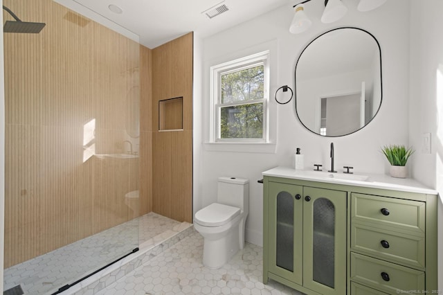 82 Indian Hill Rd, Wilton, CT 06897 - full bath with toilet, walk in shower, vanity, and tile patterned flooring