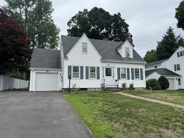 34 Knollwood Rd, East Hartford, CT 06118 - cape cod-style house with a garage, a chimney, roof with shingles, and asphalt driveway
