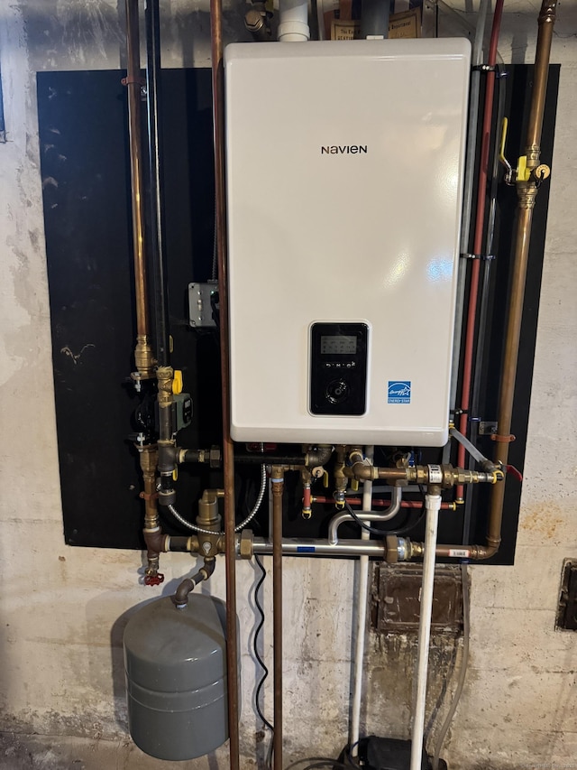 34 Knollwood Rd, East Hartford, CT 06118 - utility room featuring tankless water heater