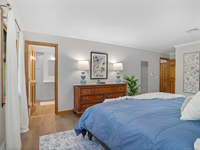 95 Pepperidge Cir, Stratford, CT 06614 - bedroom featuring visible vents, crown molding, wood finished floors, baseboards, and ensuite bathroom