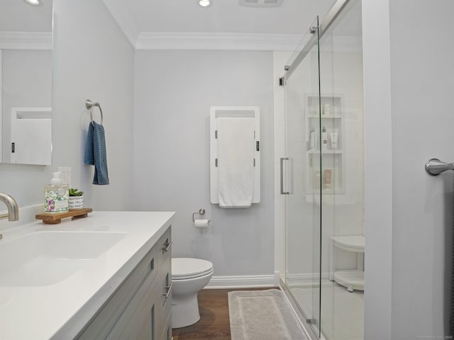95 Pepperidge Cir, Stratford, CT 06614 - bathroom featuring crown molding, toilet, recessed lighting, a shower stall, and wood finished floors