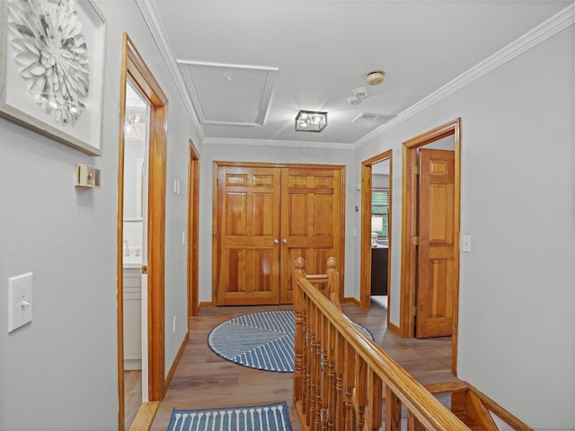 95 Pepperidge Cir, Stratford, CT 06614 - corridor with attic access, visible vents, wood finished floors, baseboards, and an upstairs landing