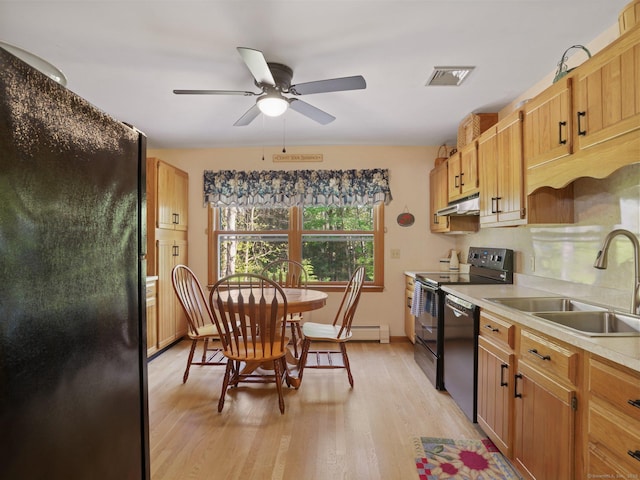 95 Pepperidge Cir, Stratford, CT 06614 - kitchen with a ceiling fan, light wood-type flooring, under cabinet range hood, a sink, and black appliances