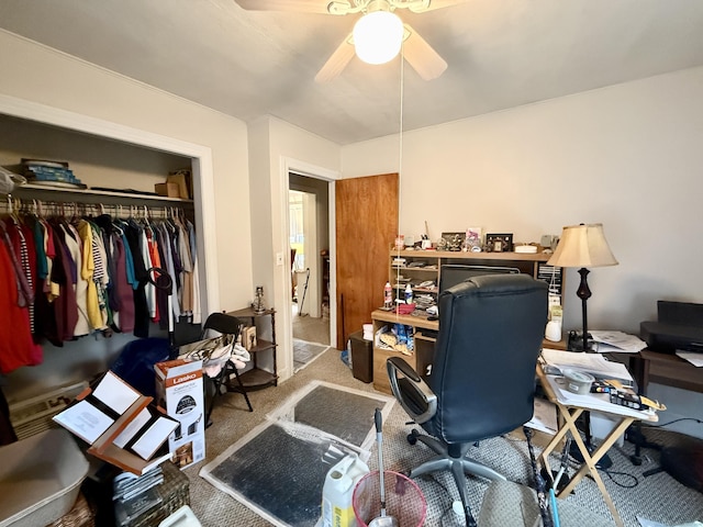 office space featuring carpet and ceiling fan