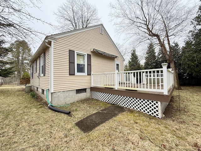 exterior space featuring a yard and a deck