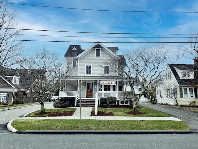 27 Catoonah St, Ridgefield, CT 06877 - view of front facade featuring covered porch