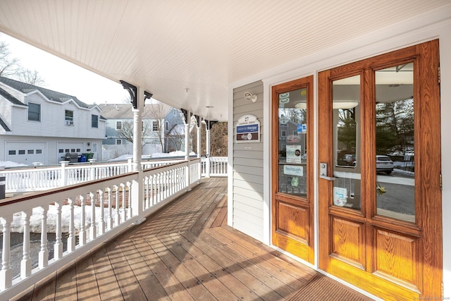 27 Catoonah St, Ridgefield, CT 06877 - wooden deck featuring a residential view and covered porch
