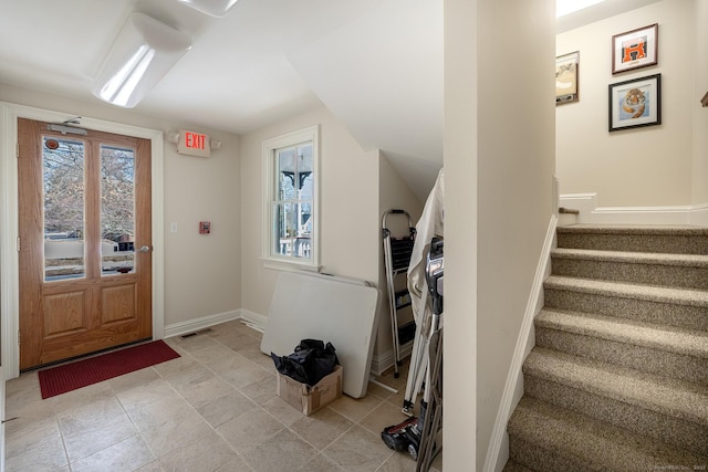27 Catoonah St, Ridgefield, CT 06877 - entryway featuring baseboards, stairs, and visible vents