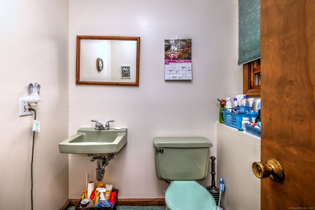 478 Alpom Dr, Orange, CT 06477 - half bath with toilet and a sink
