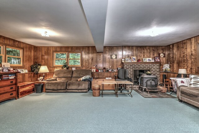 478 Alpom Dr, Orange, CT 06477 - living area with wood walls, carpet, healthy amount of natural light, and a wood stove
