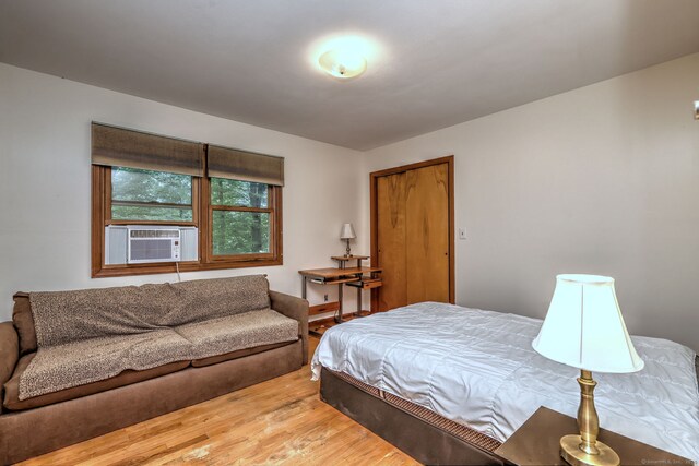 478 Alpom Dr, Orange, CT 06477 - bedroom with wood finished floors and cooling unit