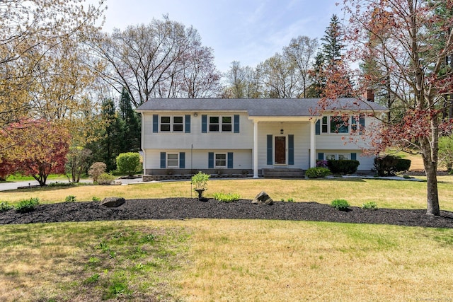 101 Michele Dr, Somers, CT 06071 - bi-level home featuring a chimney and a front yard