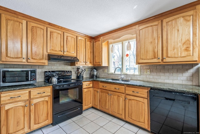 101 Michele Dr, Somers, CT 06071 - kitchen featuring a sink, light tile patterned floors, black appliances, dark stone countertops, and under cabinet range hood