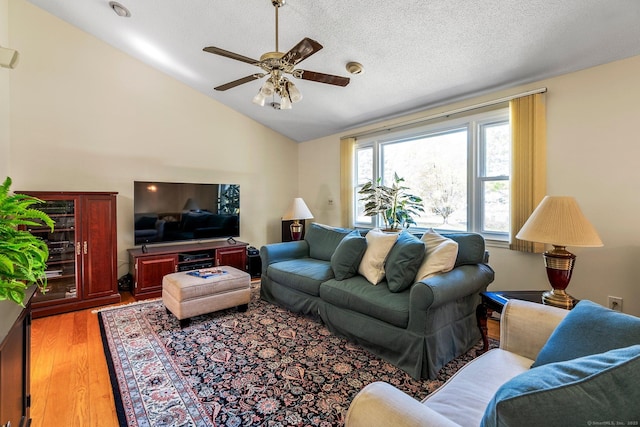 101 Michele Dr, Somers, CT 06071 - living area with a textured ceiling, ceiling fan, wood finished floors, and lofted ceiling
