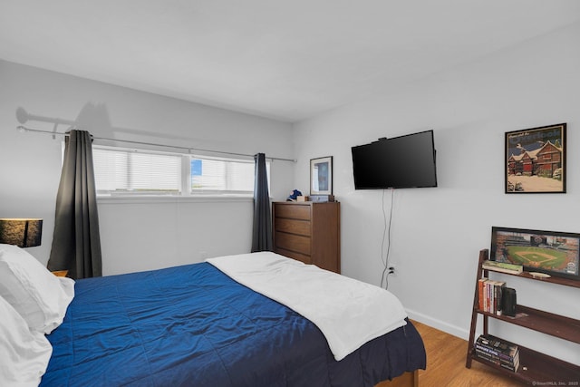 257 W Walk Unit 257, West Haven, CT 06516 - bedroom featuring baseboards and light wood-type flooring