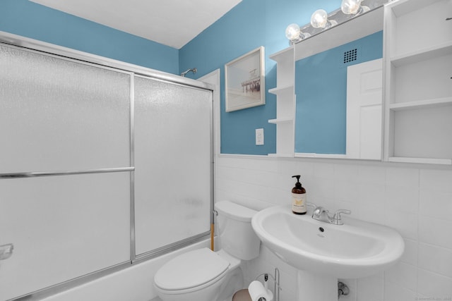 257 W Walk Unit 257, West Haven, CT 06516 - full bathroom featuring a sink, toilet, shower / bath combination with glass door, and visible vents