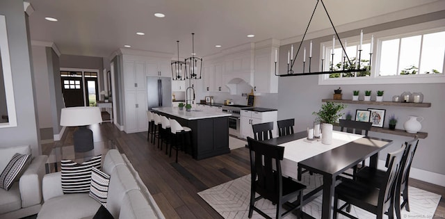 dining space featuring recessed lighting, baseboards, an inviting chandelier, and dark wood-style floors