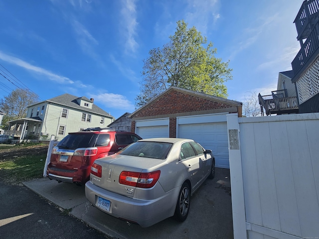 detached garage with fence