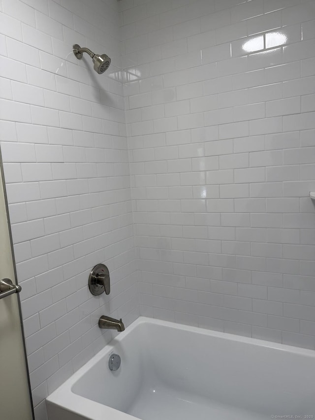 full bathroom featuring tub / shower combination