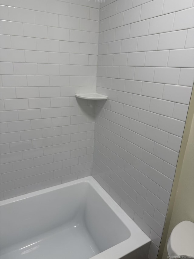 full bathroom with a shower and a bathing tub