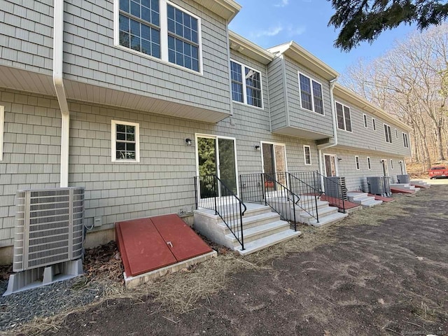 back of property with cooling unit