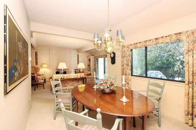 701 Heritage Vlg Unit B, Southbury, CT 06488 - dining room featuring a chandelier and light carpet